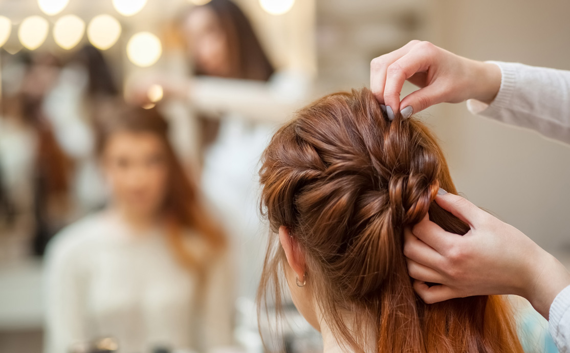 woman having her hair done at a salon